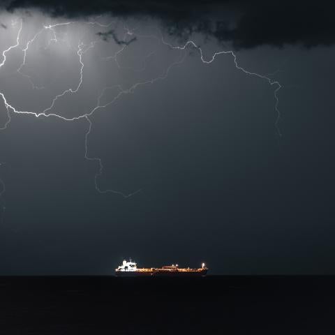 Lightning occurs when META 4, an Oil Products Tanker, sails into Muscat Anchorage on March 21, 2026, at Sultan Qaboos Port in Muscat, Oman. (Getty Images)