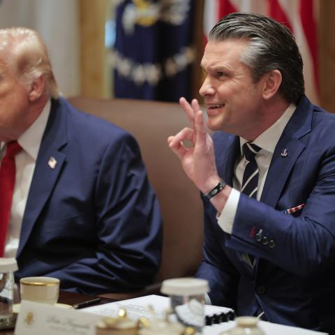 U.S. Secretary of War Pete Hegseth gestures as he speaks during a Cabinet meeting in the Cabinet Room of the White House on March 26, 2026 in Washington, DC. This is Trump's second Cabinet meeting of 2026 and the first since the United States and Israel began attacking Iran on February 28. (Photo by Chip Somodevilla/Getty Images)