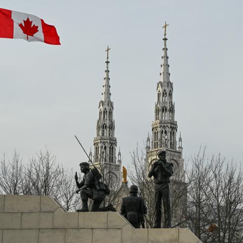 A partial view of the Reconciliation: The Peacekeeping Monument, honoring Canada's peacekeeping efforts, and the Notre-Dame Cathedral Basilica in the background, in Ottawa, Ontario, Canada, on April 30, 2025. (Photo by Artur Widak/NurPhoto via Getty Images)