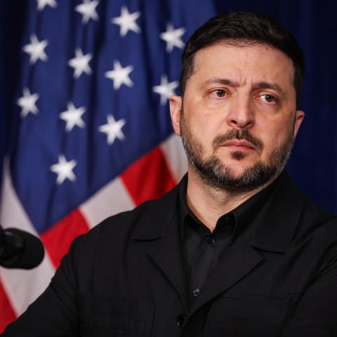 Ukrainian President Volodymyr Zelensky listens during a press conference with U.S. President Donald Trump following their meeting at Trump’s Mar-a-Lago club on December 28, 2025 in Palm Beach, Florida. Trump invited Zelensky to his private club to work on the U.S. proposed peace plan to end the war in Ukraine as the conflict approaches four years since the sudden full-scale invasion by Russia on February 24, 2022. (Photo by Joe Raedle/Getty Images)