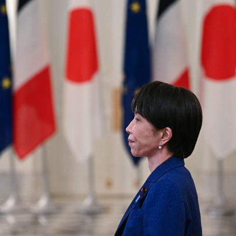 Japanese Prime Minister Sanae Takaichi waits to meet with French President Emmanuel Macron during a welcome ceremony at the Akasaka palace in Tokyo, Japan on April 01, 2026. (Photo by Philip Fong / Pool / AFP/Anadolu via Getty Images)