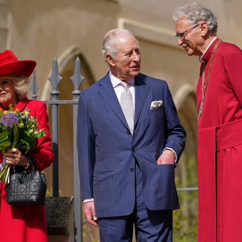 King Charles III and Queen Camilla talk to Reverend Christopher Cocksworth as they leave after attending the 2026 Easter Matins Service at St George's Chapel on April 5, 2026 in Windsor, England. (Photo by Alberto Pezzali - WPA Pool/Getty Images)