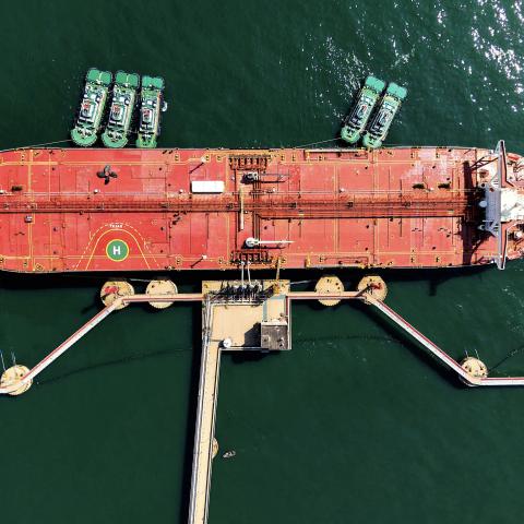 An oil tanker is docked unloading crude oil at the port in Qingdao, in China's eastern Shandong province, on April 7, 2026. (Photo by CN-STR / AFP via Getty Images)