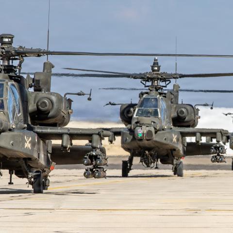 A flight of U.S. Army AH-64 Apache attack helicopters, armed with rockets and Hellfire missiles, taxi out to conduct a scheduled flight in the U.S. Central Command area of responsibility. In addition to rockets and missiles, the Apache is additionally armed with a 30mm chain gun. (U.S. Army photo)