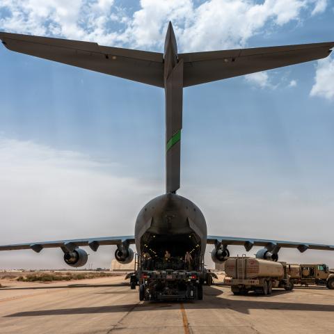 U.S. Air Force Airmen load cargo onto a C-17 Globemaster III aircraft at a base in the Middle East during Operation Epic Fury, April 18, 2026. (U.S. Air Force photo by Senior Airman Travis Knauss)