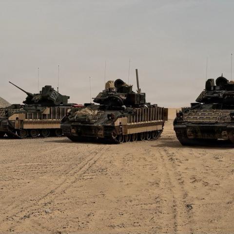 A team of U.S. Army M3 Cavalry Fighting Vehicles stand guard in the U.S. Central Command area of responsibility. The M3 is the U.S. Army's armored reconnaissance vehicle and a member of the Bradley Fighting Vehicle family, armed with a 25mm chain gun, a 7.62mm machine gun, and an anti-tank missile launcher. (U.S. Army photo