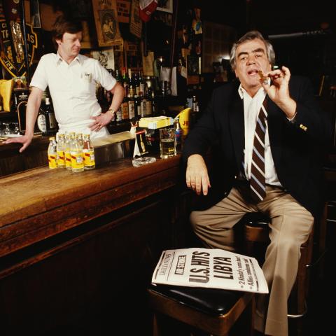 Jimmy Breslin with a copy of the Daily News in New York City in 1986. (Getty Images)
