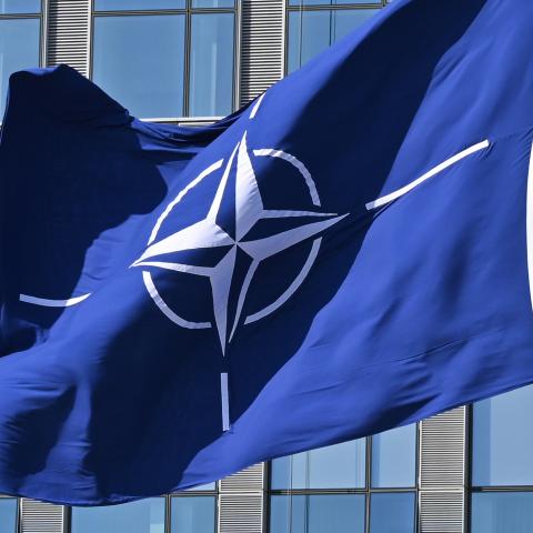 A NATO flag flies in the wind in front of the NATO headquarters in Brussels on April 3, 2025. (Getty Images)