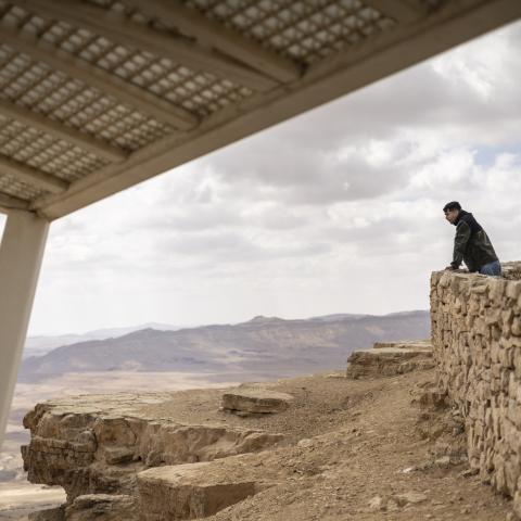 A visitor looks at the view at Ramon Crater in Negev desert of southern Israel on March 15, 2026. (Getty Images)
