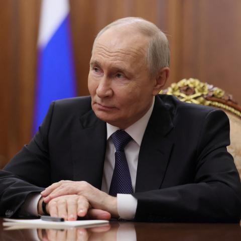 Russian President Vladimir Putin looks during a meeting at the Kremlin in Moscow late on April 29, 2026. (Getty Images) Share to Twitter