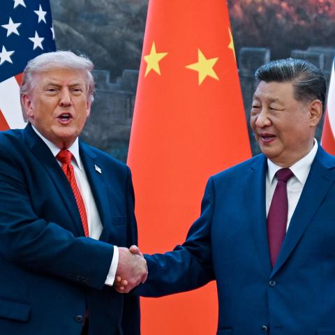 Caption US President Donald Trump shakes hands with China's President Xi Jinping at the Great Hall of the People in Beijing on May 14, 2026. (Getty Images)