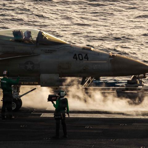 An F/A-18E Super Hornet prepares to launch from the flight deck of the USS Abraham Lincoln during Operation Epic Fury on March 29, 2026. (US Navy)