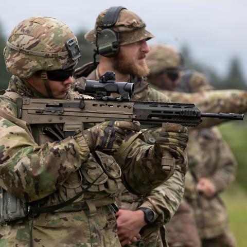 U.S. Army Pfc. Michael Rolli, assigned to Alpha Company, 8th Brigade Engineer Battalion, 2nd Armored Brigade Combat Team, 1st Cavalry Division, shoots a SA80 rifle alongside a British Army soldier, range safety of the Light Dragoons, Forward Land Forces Battle Group-Poland, during close-quarters battle practice, Bemowo Piskie Training Area, Poland, June 11, 2026. U.S. forces in Europe conduct routine training in Poland to enhance interoperability with NATO allies and maintain readiness along the alliance’s 