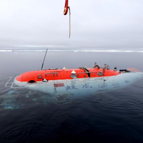 China’s manned deep-sea submersible Jiaolong is lowered into the Arctic Ocean on August 6, 2025. (Getty Images)