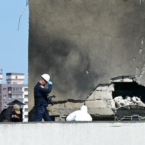 Police and forensic investigators examine the location of impact after a Russian drone struck an apartment building in Galati, eastern Romania. on May 29, 2026. (Getty Images)