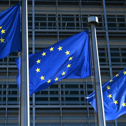Flags with the logo of the European Union wave in the wind in front of the European Commission building, on May 22, 2026. (Getty Images)