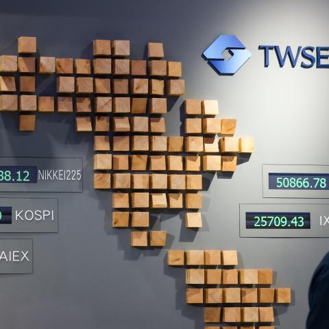 Caption A man walks inside the Taiwan Stock Exchange in Taipei on June 8, 2026. (Getty Images)