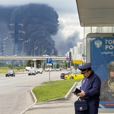T - Black smoke rises from the area of the Russian oil producer Gazprom Neft's Moscow oil refinery on the south-eastern outskirts of Moscow on June 18, 2026. Moscow was fending off a "large-scale" drone attack from Ukraine, with several drones reaching an oil refinery, the city's mayor Sergey Sobyanin said early on June 18, 2026. (Photo by AFP via Getty Images)