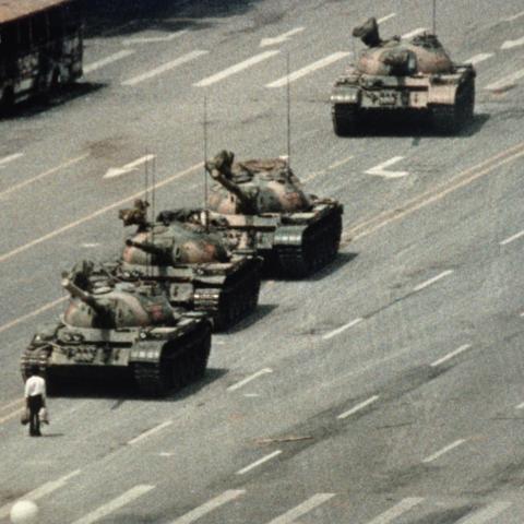 A Beijing demonstrator blocks the path of a tank convoy along the Avenue of Eternal Peace near Tiananmen Square on June 5, 1989. (Getty Images)
