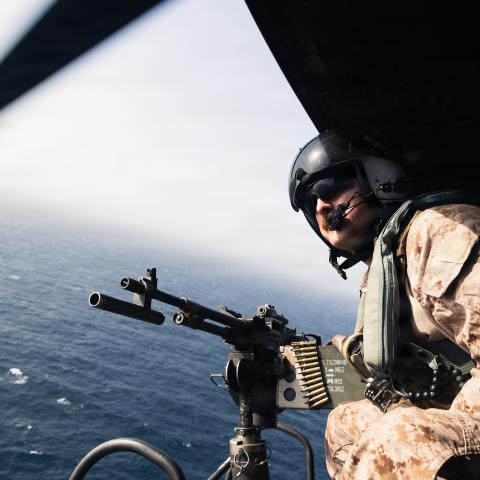 A U.S. Marine with Marine Medium Tiltrotor Squadron (VMM) 265 (Rein.), 31st Marine Expeditionary Unit, conduct flight operations aboard a UH-1Y Venom in the U.S. Central Command area of responsibility, June 15, 2026. (U.S. Marine Corps photo by Sgt. Alora Finigan)