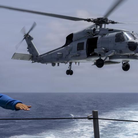 MEDITERRANEAN SEA (July 12, 2026) Seaman Joshua Tejeda sends off an MH-60R Seahawk helicopter, assigned to Helicopter Maritime Strike Squadron (HSM) 79, during a vertical replenishment evolution aboard the Arleigh Burke-class guided-missile destroyer USS Paul Ignatius (DDG 117), July 12, 2026. Paul Ignatius is on a scheduled deployment in the U.S. 6th Fleet area of operations to support the warfighting effectiveness, lethality and readiness of U.S. Naval Forces Europe-Africa, and defend U.S., Allied and par