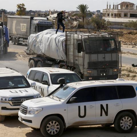 Trucks carrying food and fuel enter the Gaza Strip through the Kissufim Crossing in central Gaza, accompanied by a United Nations team, on October 17, 2025. (Getty Images)