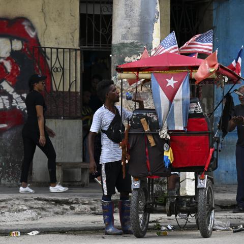 A tricycle decorated with US and Cuban flags is seen in Havana on June 15, 2026. (Getty Images) Share to Twitter