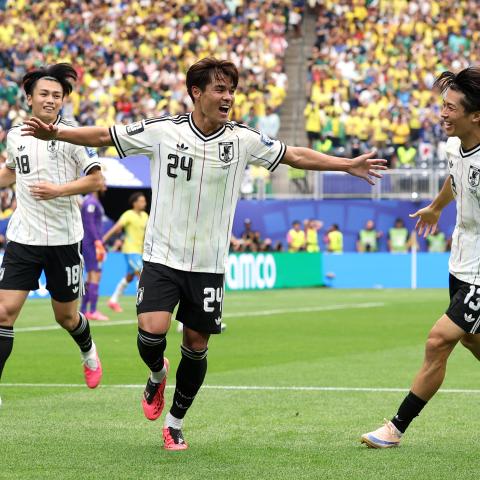 Kaishu Sano of Japan celebrates with Ayase Ueda and Keito Nakamura after scoring the team's first goal during the FIFA World Cup 2026 Round of 32 on June 29, 2026, in Houston, Texas. (Getty Images)