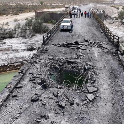 A hole is visible in a damaged bridge following US air strikes carried out a day earlier in the southern Hormozgan Province, Iran, on July 17, 2026. (Getty Images)