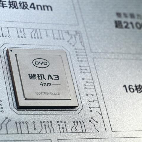 A Xuanji A3 chip is pictured at the BYD booth during the World Artificial Intelligence Conference (WAIC) in Shanghai on July 18, 2026. (Photo by Hector RETAMAL / AFP via Getty Images)