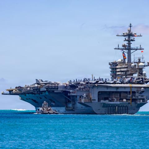 The aircraft carrier USS Theodore Roosevelt departs Joint Base Pearl Harbor-Hickam in Hawaii during Exercise Rim of the Pacific on July 7, 2026. (DVIDS)