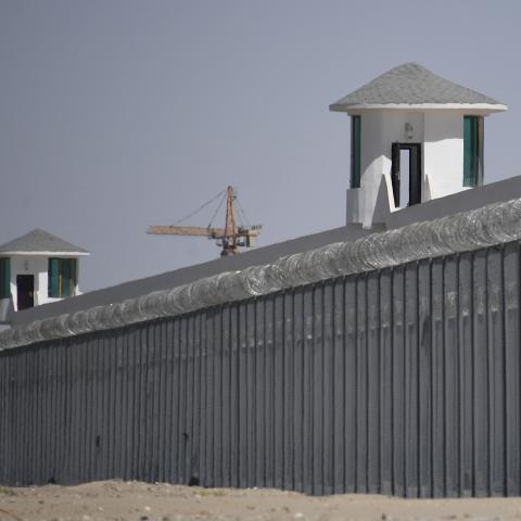 Watchtowers are seen on May 31, 2019, at a high-security facility near what is believed to be a reeducation camp where mostly Muslim ethnic minorities are detained on the outskirts of Hotan, China. (Getty Images)