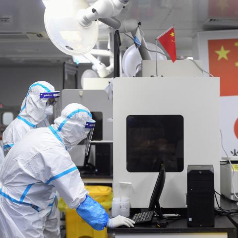 Laboratory technicians work on samples to be tested for the COVID-19 coronavirus at a testing facility in Wuhan, China on August 4, 2021. (Getty Images)