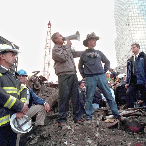 President George W. Bush speaks from the rubble of Ground Zero on September 14, 2001, in New York City. (Getty Images)