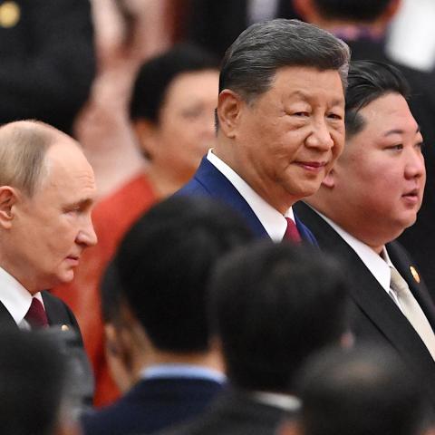 China’s President Xi Jinping, North Korea’s leader Kim Jong Un, and Russia’s President Vladimir Putin arrive for a reception in the Great Hall of the People in Beijing on September 3, 2025. (Getty Images)