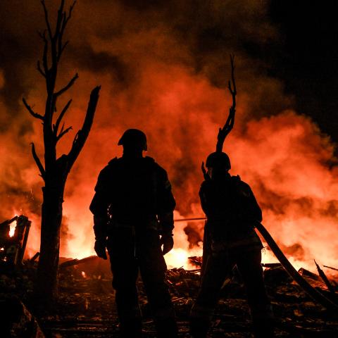 Ukrainian rescuers extinguish a large-scale fire that broke out following a Russian strike using a North Korean ballistic missile on Zaporizhzhia, Ukraine, on August 11, 2026. (Getty Images) 
