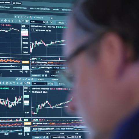 Traders work on the floor of the New York Stock Exchange during morning trading on August 18, 2026, as stocks open lower amid concerns about persistently rising inflation and elevated oil prices. (Getty Images)