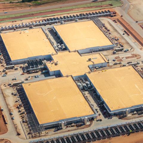 ABILENE, TEXAS - AUGUST 26: In an aerial view, the Stargate Oracle AI data center campus is seen on August 26, 2026 in Abilene, Texas. The Stargate Oracle AI data center will span roughly 4 million square feet and will be operated by Oracle for OpenAI. The facility is the first Stargate site to go live and is expected to be fully completed by the end of 2026. Data centers continue to be a major topic of discussion heading into the 2026 Midterm elections with conservatives raising concerns about property rig