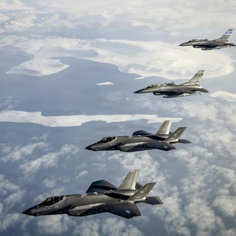 North American Aerospace Defense Command F-35 Lightning II aircraft with the Wisconsin Air National Guard and F-16 Fighting Falcon aircraft with the South Carolina Air National Guard fly over Greenland on October 7, 2025. (US Air National Guard)