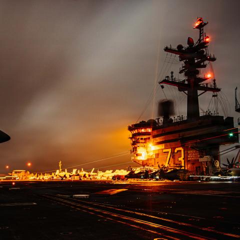 An F/A-18 Super Hornet lands on the flight deck of the USS George Washington on August 29, 2026, in the US 5th Fleet area of operations while supporting maritime security and stability in the Middle East. (US Navy)