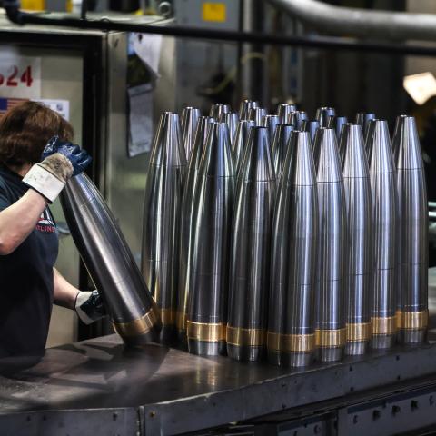 An employee handles 155 mm caliber shells after the manufacturing process at the Scranton Army Ammunition Plant (SCAAP) in Scranton, Pennsylvania, on April 16, 2024. (Getty Images)