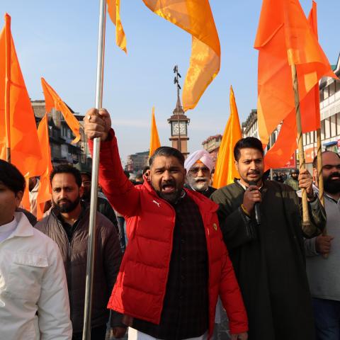 Leaders and members of the Rashtriya Swayamsevak Sangh (RSS) carry party flags during a rally in Srinagar, Jammu and Kashmir, on February 6, 2026. (Getty Images)
