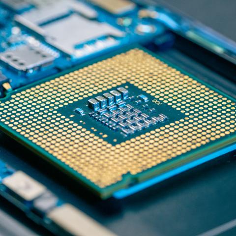 A close-up view of a CPU socket on a computer motherboard. (Getty Images)