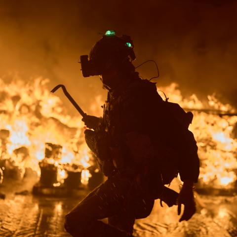 KYIV, UKRAINE - SEPTEMBER 08: Firefighters deal with the aftermath of a massive Russian missile and drone attack on September 8, 2026 in Kyiv, Ukraine. According to local authorities, the attack caused destruction and fires across at least five districts of the capital resulting in at least two fatalities and seven injuries. Air defense forces reported the interception of two ballistic missiles, 31 cruise missiles, and 142 drones. Debris strikes caused severe damage to residential buildings, warehouses, and
