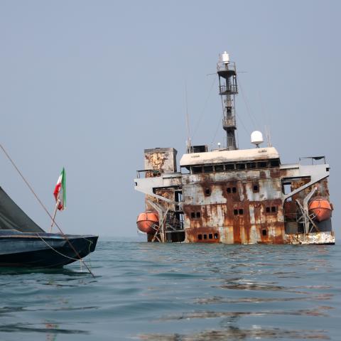 An Iranian Revolutionary Guard Corps Navy warship struck by a US missile lies off the coast of Bandar Abbas, Iran, on September 9, 2026. (Getty Images)