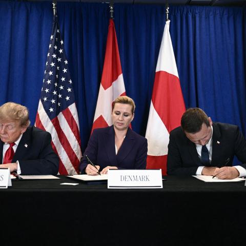 US President Donald Trump, Denmark’s Prime Minister Mette Frederiksen and Greenland’s Prime Minister Jens-Frederik Nielsen sign a trilateral security deal on the sidelines of the 81st United Nations General Assembly in New York on September 22, 2026. (Getty Images)
