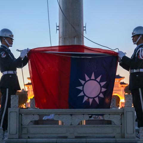Taiwanese honor guards participate in a flag-lowering ceremony at the Liberty Square in Taipei, Taiwan, on September 23, 2026. (Getty Images)