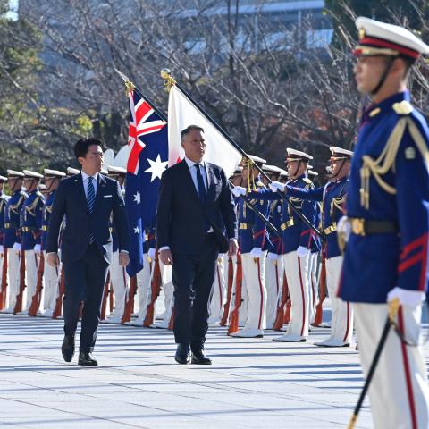 Japan's Defence Minister Shinjiro Koizumi (L) and Australia's Defence Minister Richard Marles review honour guards during a welcome ceremony at the Ministry of Defense in Tokyo on December 7, 2025. (Photo by David Mareuil / POOL / AFP via Getty Images)