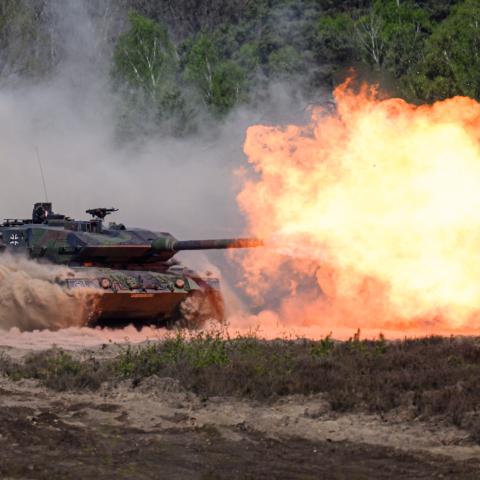 A Leopard 2A6 tank fires during a demonstration as German Chancellor Friedrich Merz visited troops at the Bundeswehr’s barracks in Munster, Germany, on April 30, 2026. (Getty Images)