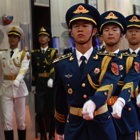 Soldiers from the Chinese People’s Liberation Army prepare for the opening ceremony of the Beijing Xiangshan Forum on security dialogue on September 16, 2026. (Getty Images)
